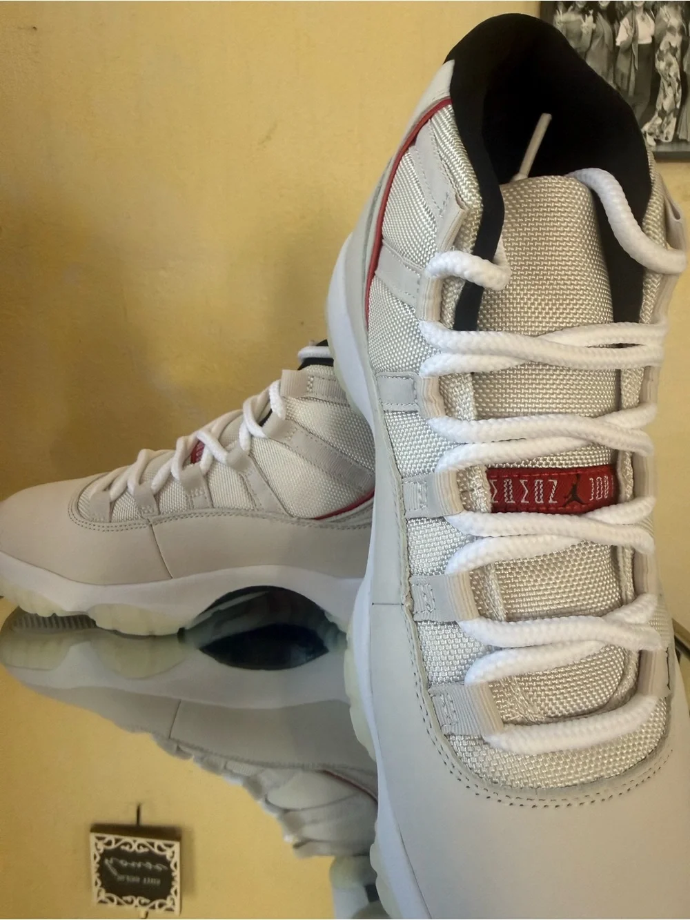 NEW Air Jordan 11 Retro in Platinum Tint and University Red